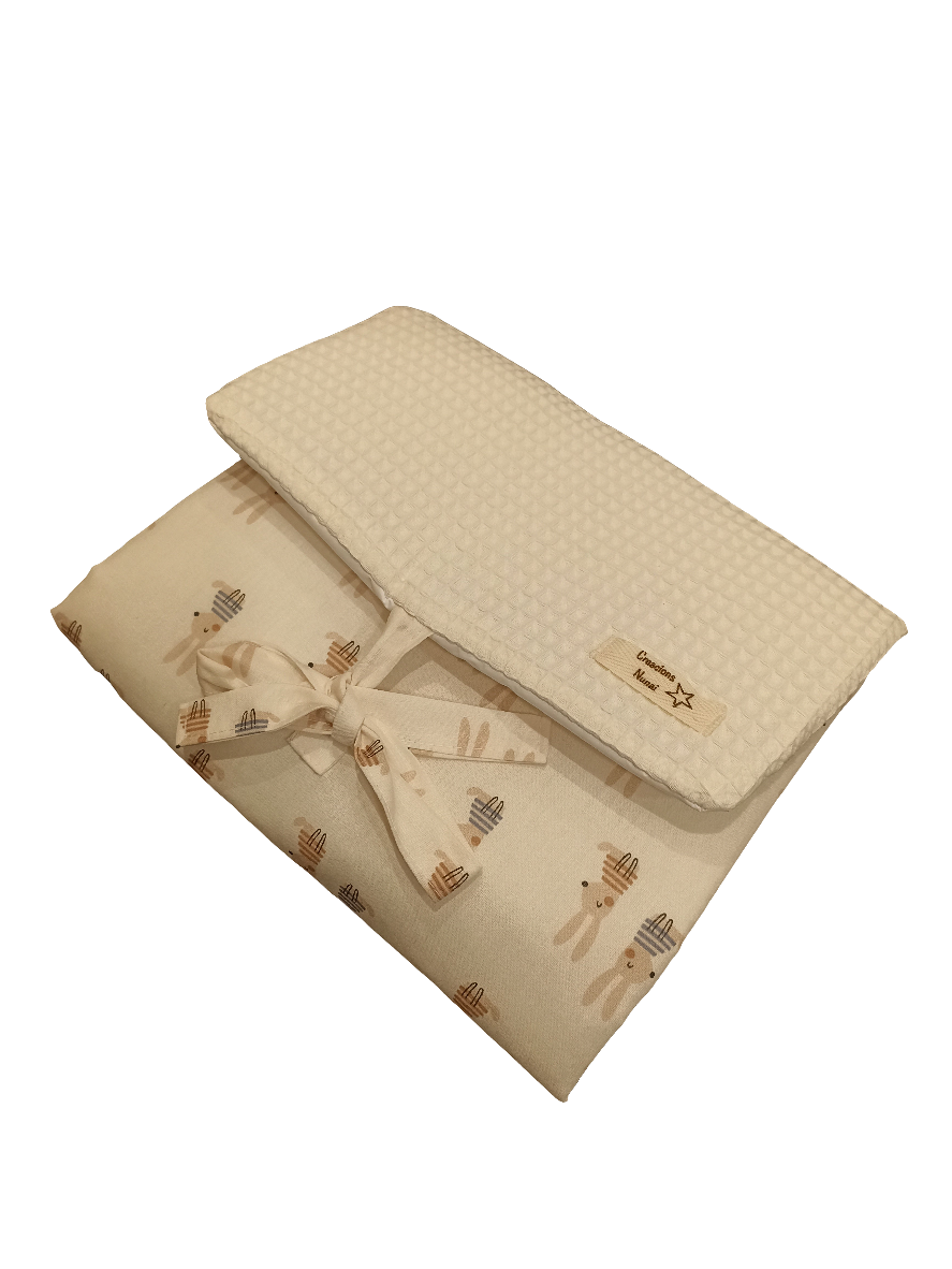 Cambiador viaje estampado conejos.