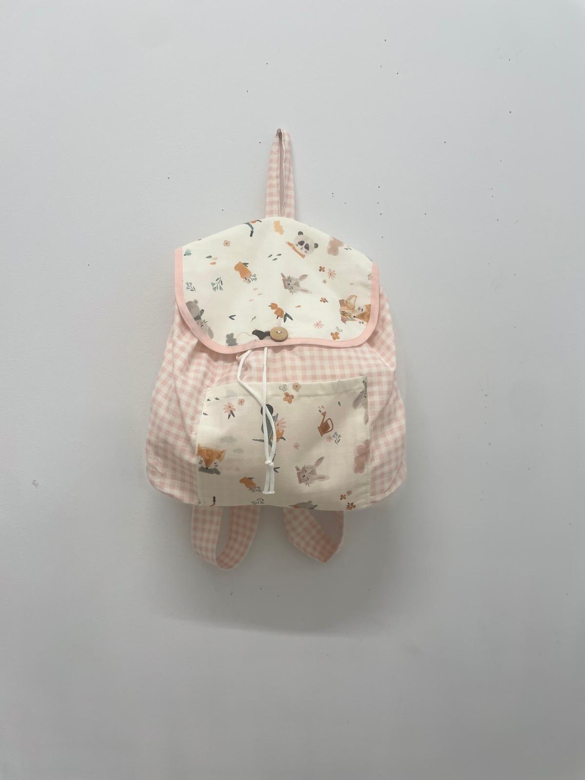 Mochila de tela en cuadro vichy rosa con tejido y estampado en 100% algodón