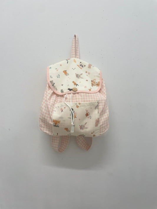 Mochila de tela en cuadro vichy rosa con tejido y estampado en 100% algodón