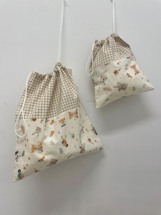 Bolsita ropita y merienda tela.